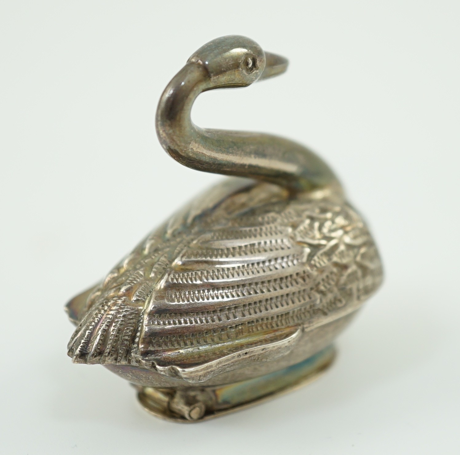 A late Victorian Dutch silver novelty vinaigrette, modelled as a swan, import marks for Samuel Boyce Landeck